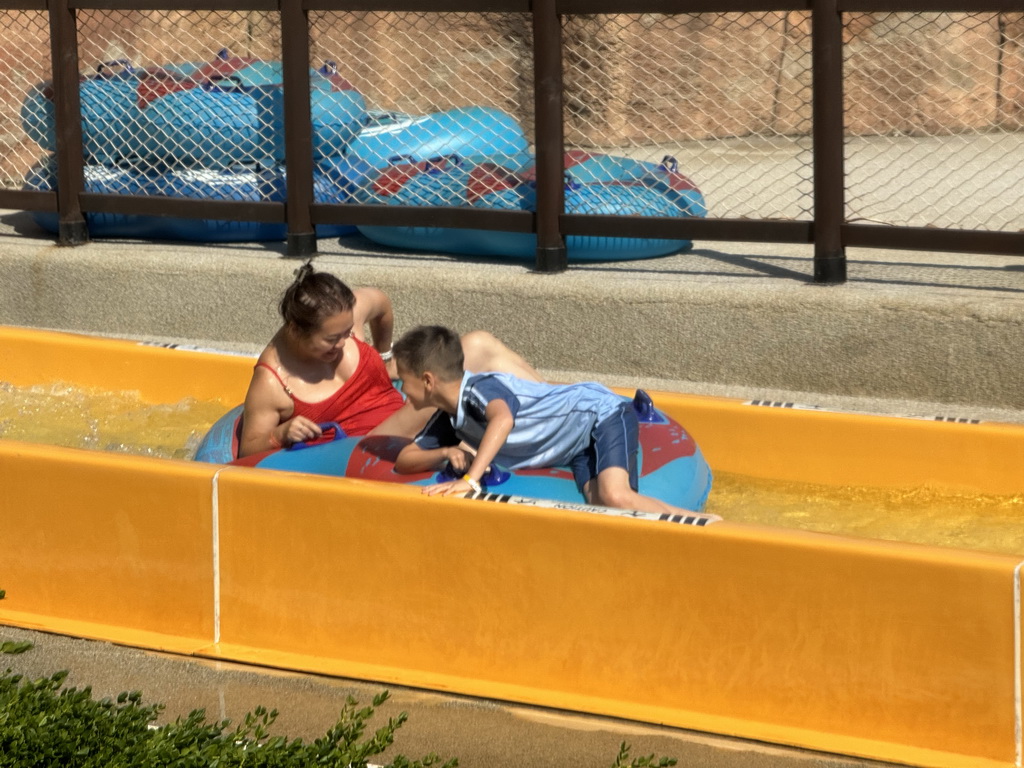 Miaomiao and Max in a tube at the bottom of the Tower Falls attraction at the Aqua Land area of the Land of Legends theme park