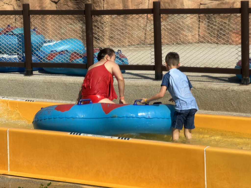 Miaomiao and Max in a tube at the bottom of the Tower Falls attraction at the Aqua Land area of the Land of Legends theme park