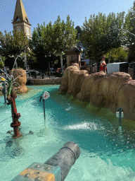 Miaomiao next to the Watermania attraction at the Adventure Land area of the Land of Legends theme park, viewed from a boat