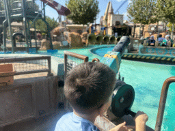 Max at a boat of the Watermania attraction at the Adventure Land area of the Land of Legends theme park