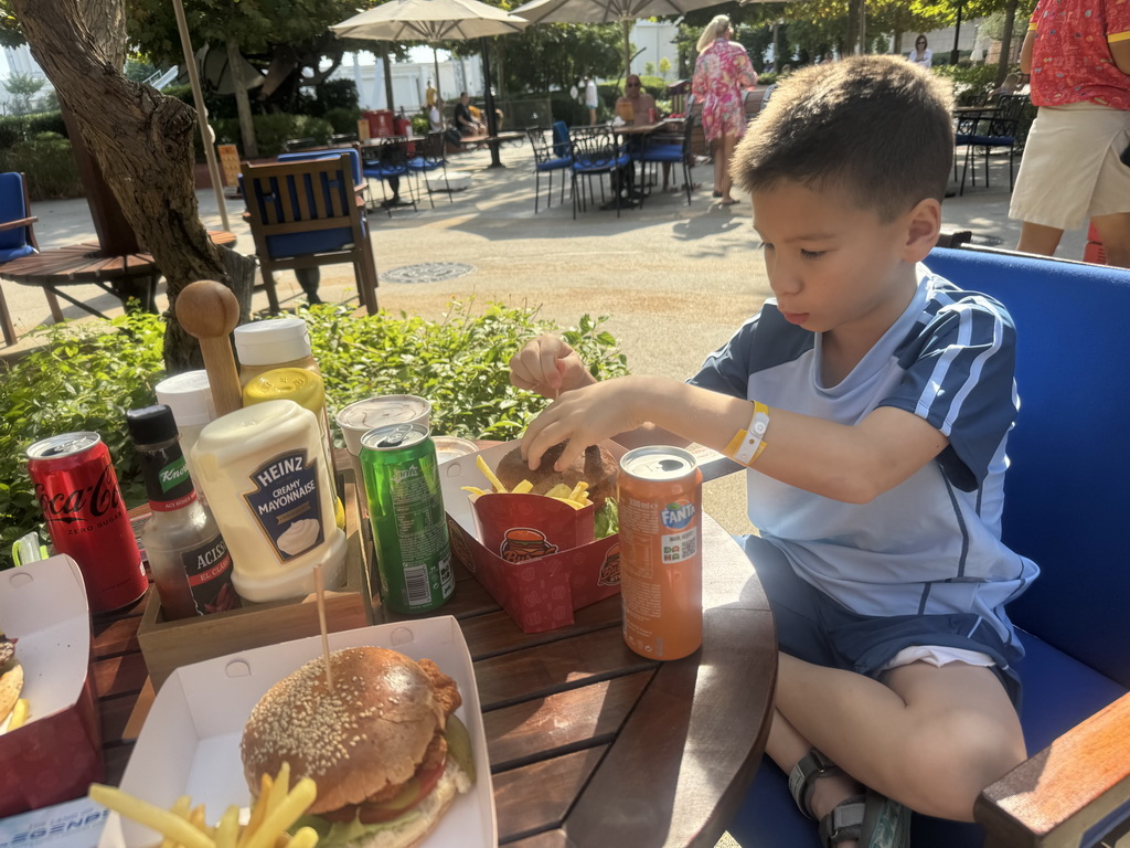 Max having lunch at the Burger Stop restaurant at the Adventure Land area of the Land of Legends theme park