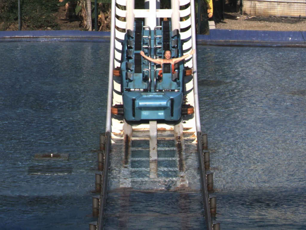 Miaomiao at the end of the Typhoon Coaster attraction at the Adventure Land area of the Land of Legends theme park