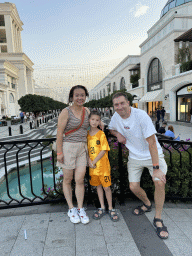 Tim, Miaomiao and Max on a bridge over the canal at the Shopping Avenue area of the Land of Legends theme park