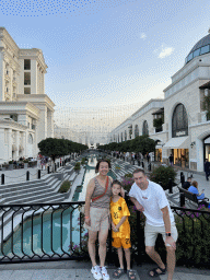 Tim, Miaomiao and Max on a bridge over the canal at the Shopping Avenue area of the Land of Legends theme park