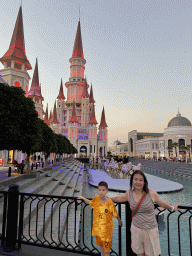 Miaomiao and Max with the horse statues in front of the Chateau at the Shopping Avenue area of the Land of Legends theme park