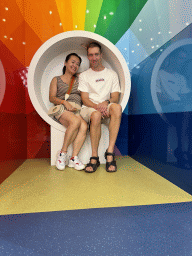Tim and Miaomiao in a chair at the Candy Candy store at the Shopping Avenue area of the Land of Legends theme park