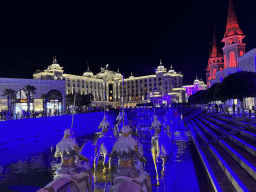 Horse statues in front of the Kingdom Hotel at the Shopping Avenue area of the Land of Legends theme park, by night