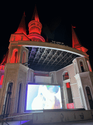 Screen at the back side of the Chateau at the Shopping Avenue area of the Land of Legends theme park, by night