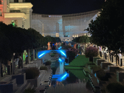 Bridge over the canal at the Shopping Avenue area of the Land of Legends theme park, during the Musical Boat Parade, by night