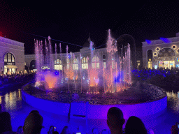 Light show at the Chimera Fountain at the Shopping Avenue area of the Land of Legends theme park, during the Musical Boat Parade, by night