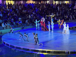 Actors in front of the Chateau at the Shopping Avenue area of the Land of Legends theme park, during the Musical Boat Parade, by night