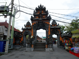 Southeast side of the gate at the parking lot of the Pura Tanah Lot temple complex
