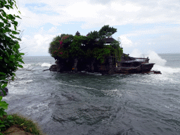 The Pura Tanah Lot temple, viewed from the shore at the Pura Luhur Penataran temple