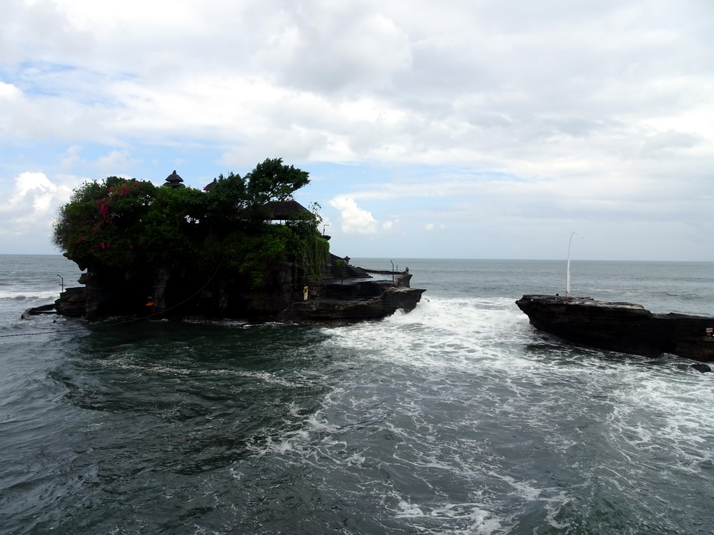 The Pura Tanah Lot temple, viewed from the shore at the Pura Luhur Penataran temple