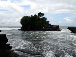 The Pura Tanah Lot temple, viewed from the shore at the Pura Luhur Penataran temple