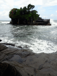 The Pura Tanah Lot temple, viewed from the shore at the Pura Luhur Penataran temple