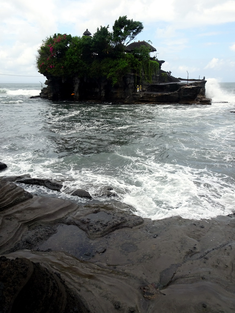 The Pura Tanah Lot temple, viewed from the shore at the Pura Luhur Penataran temple