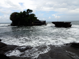 The Pura Tanah Lot temple, viewed from the shore at the Pura Luhur Penataran temple