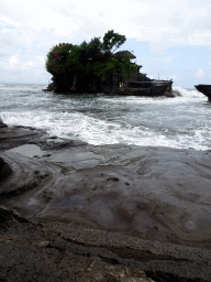 The Pura Tanah Lot temple, viewed from the shore at the Pura Luhur Penataran temple