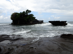 The Pura Tanah Lot temple, viewed from the shore at the Pura Luhur Penataran temple