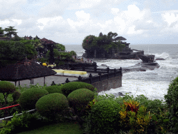 The Pura Luhur Penataran temple and the Pura Tanah Lot temple, viewed from the gardens of the Pura Tanah Lot temple complex