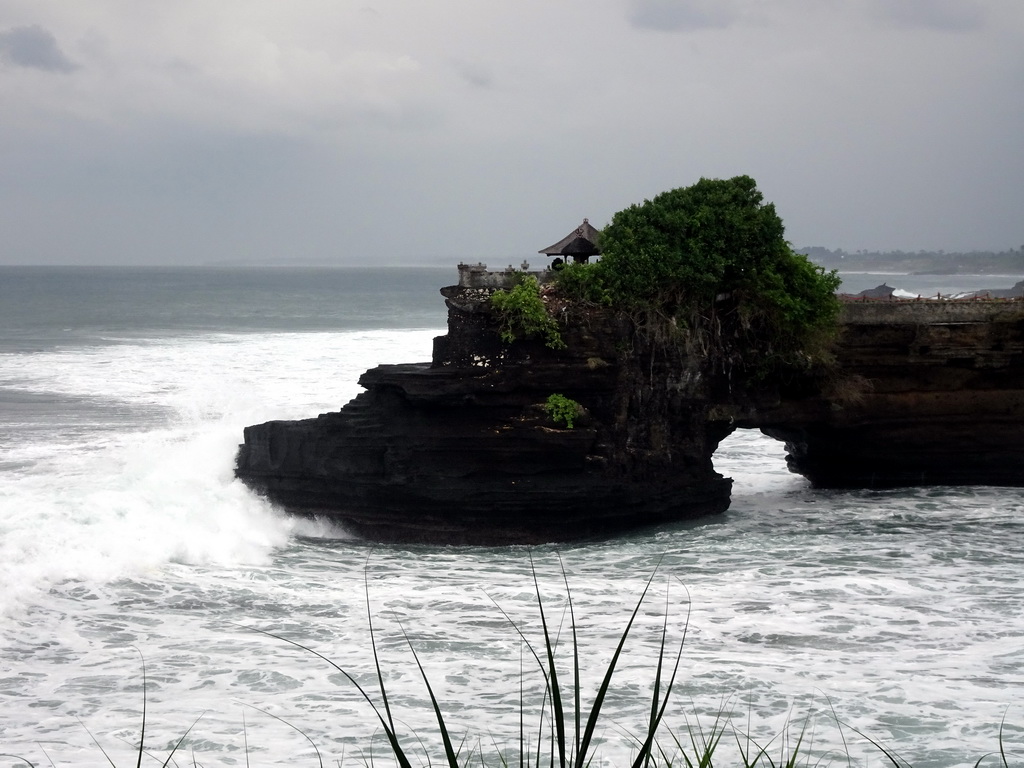 The Pura Batu Bolong temple, viewed from the gardens of the Pura Tanah Lot temple complex