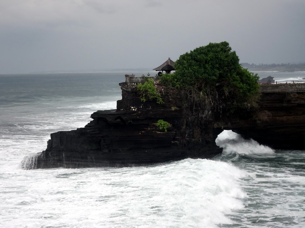 The Pura Batu Bolong temple, viewed from the gardens of the Pura Tanah Lot temple complex