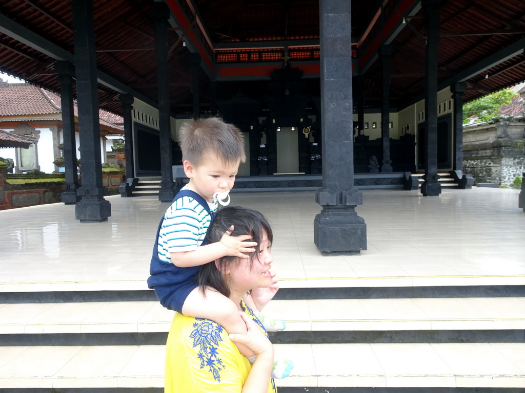 Miaomiao and Max at the pavilion at the entrance to the Pura Tanah Lot temple complex