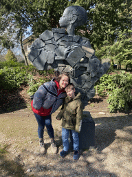 Miaomiao and Max with an Africa statue in front of the Africa Museum at the Postweg road