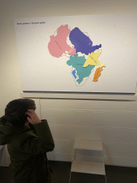 Max with a map of Africa compared to countries at the Ground Floor of the Africa Museum
