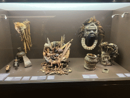 Masks and tools at the Upper Floor of the Africa Museum, with explanation