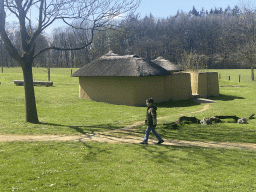 Max in front of the Ghana village at the Museumpark of the Africa Museum