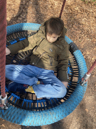 Max on a swing at the playground at the Museumpark of the Africa Museum