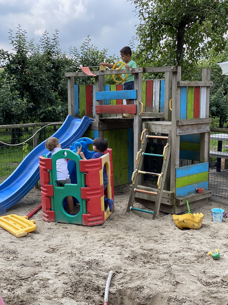 Max and his friend at the playground at the FrankenFruit fruit farm