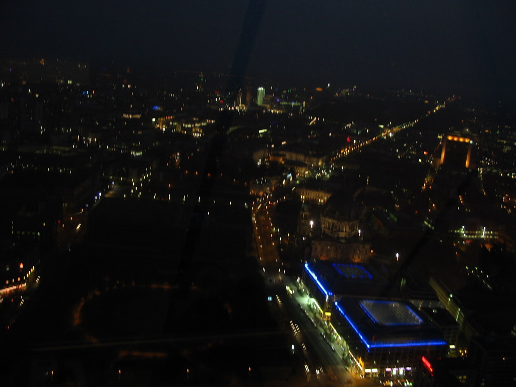 West side of the city with the Berlin Cathedral, the DDR Museum and the AquaDom & Sea Life Berlin building, viewed from the viewing point on top of the Fernsehturm tower, by night