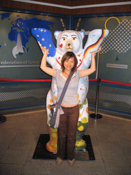 Miaomiao with a United Buddy Bear statue at the Fernsehturm tower