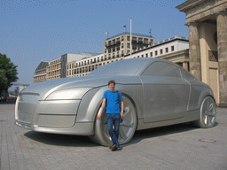 Tim with a giant Audi car at the back side of the Brandenburger Tor gate