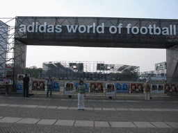 Miaomiao in front of the Adidas World of Football at the Platz der Republik square with a scale model of the Olympiastadion stadium