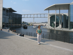 Miaomiao in front of the Spree river and the Marie-Elisabeth-Lüders-Haus building