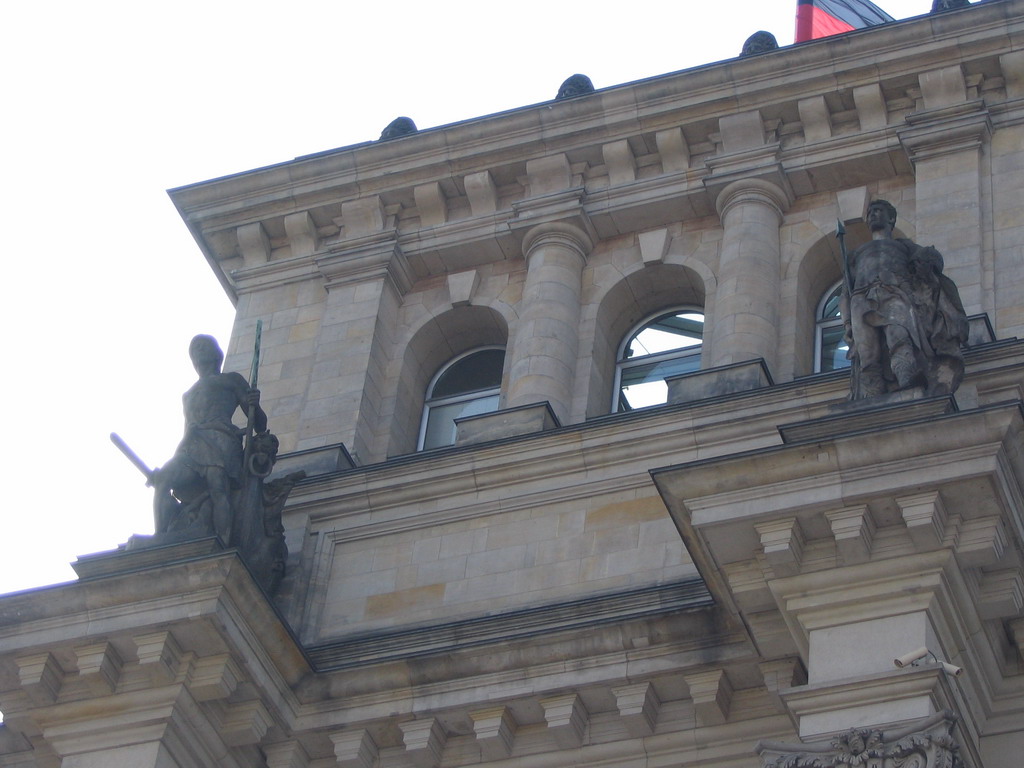Statues on the east side of the Reichstag building at the Friedrich-Ebert-Platz square