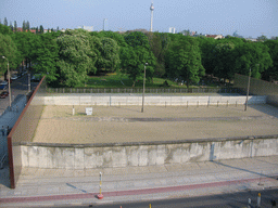 Remains of the Berlin Wall at the Bernauer Straße street, Memorial Park, the Friedhof Sophien II cemetery and the Fernsehturm tower, viewed from the top of the Gedenkstätte Berliner Mauer museum