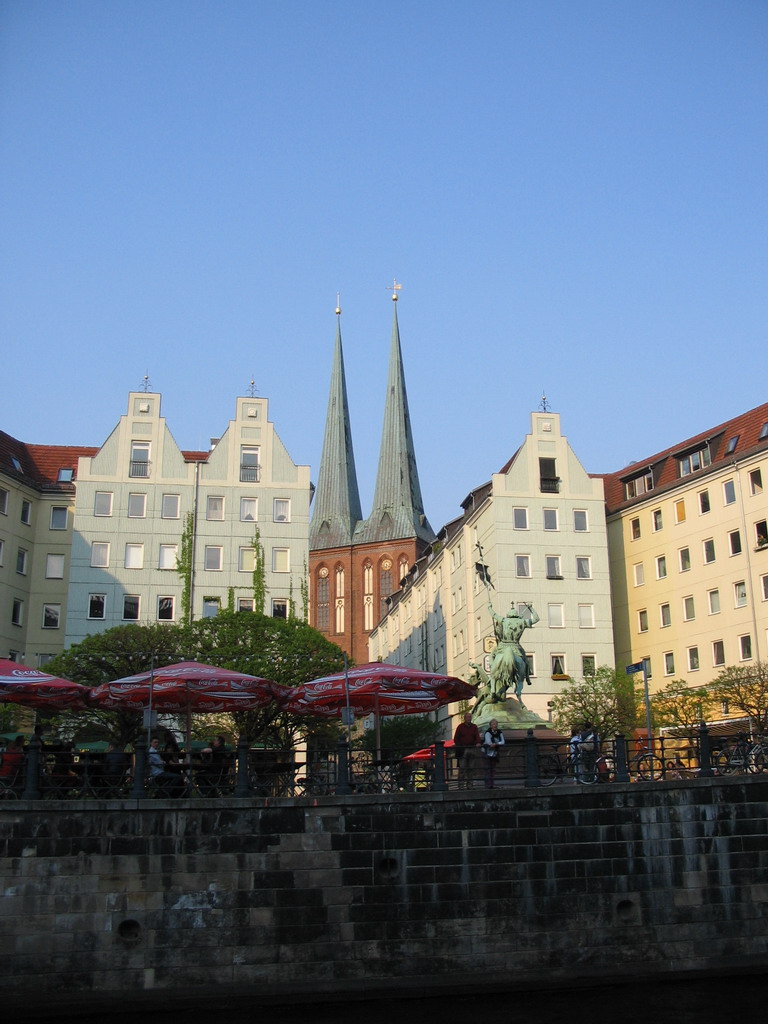 The Propststraße street with the Statue of Saint Georges and the Nikolaikirche church, viewed from the tour boat on the Spree river