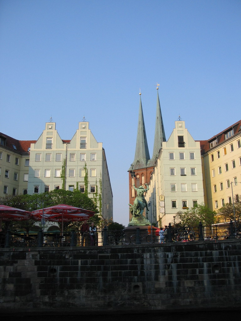 The Propststraße street with the Statue of Saint Georges and the Nikolaikirche church, viewed from the tour boat on the Spree river