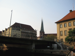 The Mühlendammbrücke bridge over the Spree river and the Nikolaikirche church, viewed from the tour boat