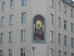 Fresco at the front of the Ganymed Brasserie at the Schiffbauerdamm street, viewed from the tour boat on the Spree river