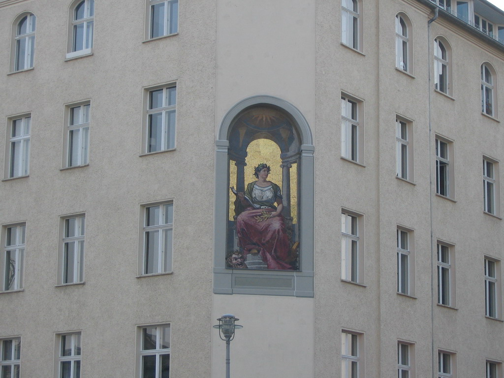 Fresco at the front of the Ganymed Brasserie at the Schiffbauerdamm street, viewed from the tour boat on the Spree river