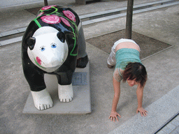 Miaomiao with a United Buddy Bear statue at the St. Wolfgang-Straße street