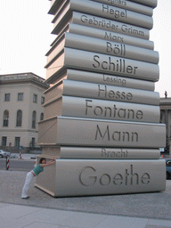 Miaomiao with the Stack of Books sculpture at the Bebelplatz square