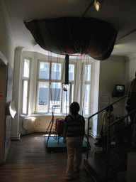 Miaomiao and a parachute at the Haus am Checkpoint Charlie museum