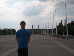 Tim in front of the Olympiastadion Berlin stadium at the Olympischer Platz square